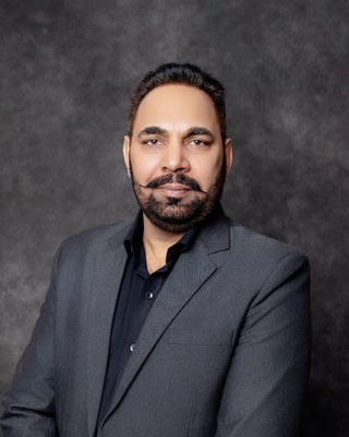 Portrait of Harinder Batth, Associate.